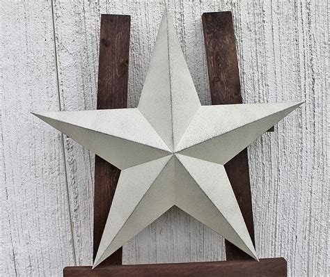 hanging a metal star on a house|large metal stars for barns.